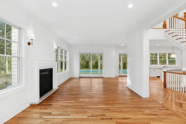 Empty room, Fireplace, Interior, Pendant Lights, Recessed Lighting, Wood Texture Flooring