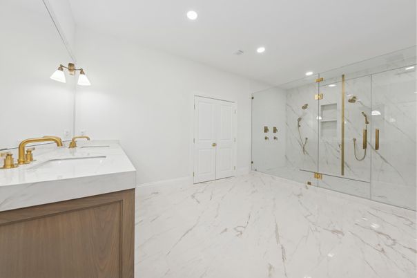 Bathroom, Dual Sink Vanities, Glass Shower, Interior, Marble, Marble Walls, Recessed Lighting
