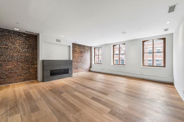 Empty room, Fireplace, Interior, Recessed Lighting, Stone Walls, Wood Texture Flooring