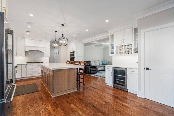 Fireplace, Interior, Kitchen, Living room, Marble Walls, Pendant Lights, Recessed Lighting, Stainless Steel Appliances, Wood Texture Flooring