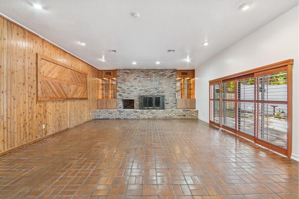 Empty room, Fireplace, Interior, Recessed Lighting, Stone Walls, Wooden Walls