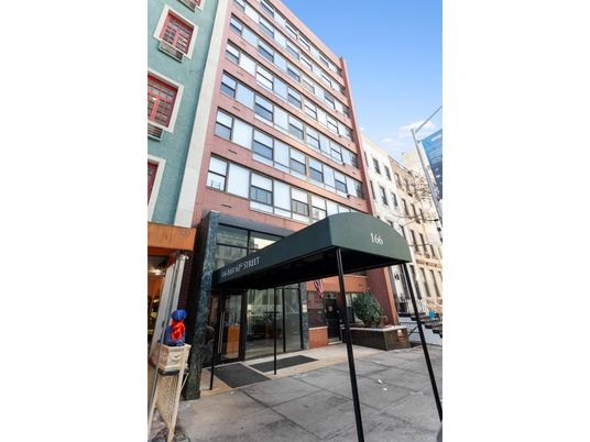 Exterior, Facade, Brick Facade, Condo Building
