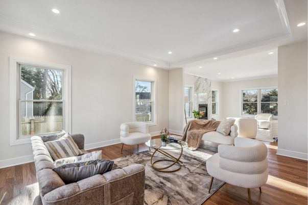 Fireplace, Interior, Living room, Marble Walls, Recessed Lighting, Wood Texture Flooring