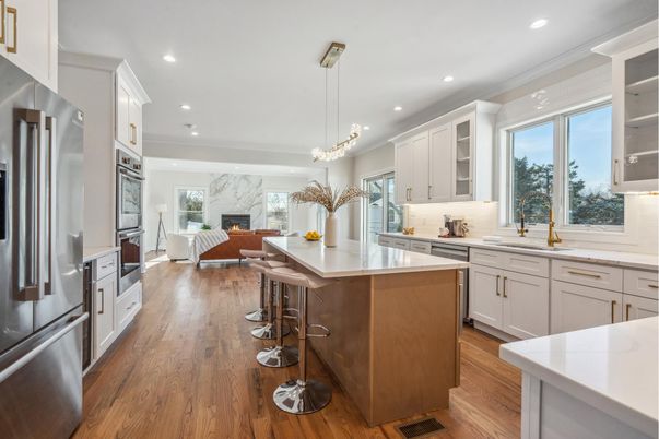 Fireplace, Interior, Kitchen, Living room, Pendant Lights, Recessed Lighting, Stainless Steel Appliances, Wood Texture Flooring
