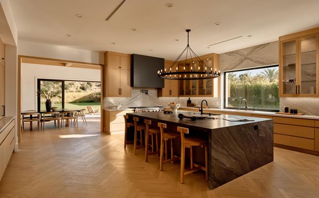 Chandelier, Dining room, Interior, Kitchen, Marble Walls, Recessed Lighting, Stainless Steel Appliances, Wood Texture Flooring
