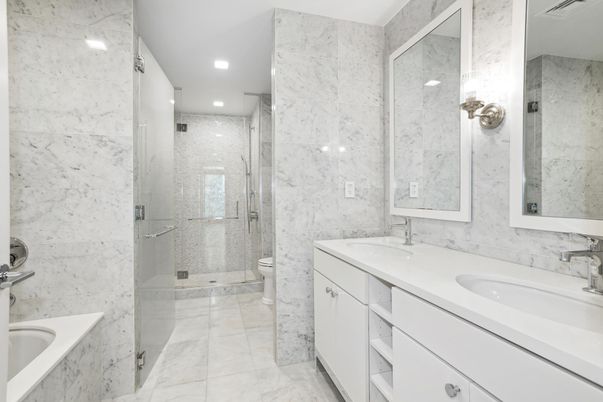 Bathroom, Dual Sink Vanities, Glass Shower, Interior, Marble, Marble Walls, Recessed Lighting