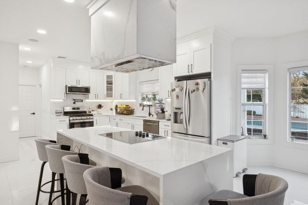 Interior, Kitchen, Marble Walls, Recessed Lighting, Stainless Steel Appliances