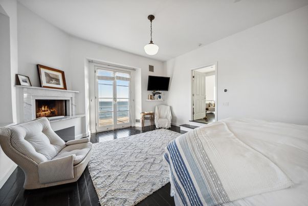 Bedroom, Fireplace, Interior, Pendant Lights, Water, Wood Texture Flooring