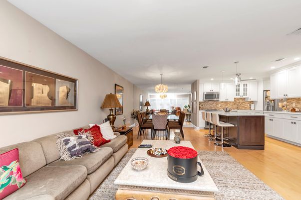 Chandelier, Dining room, Interior, Kitchen, Living room, Pendant Lights, Recessed Lighting, Stainless Steel Appliances, Wood Texture Flooring