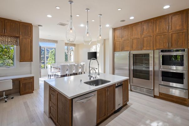 Dining room, Interior, Kitchen, Pendant Lights, Recessed Lighting, Stainless Steel Appliances, Wood Texture Flooring