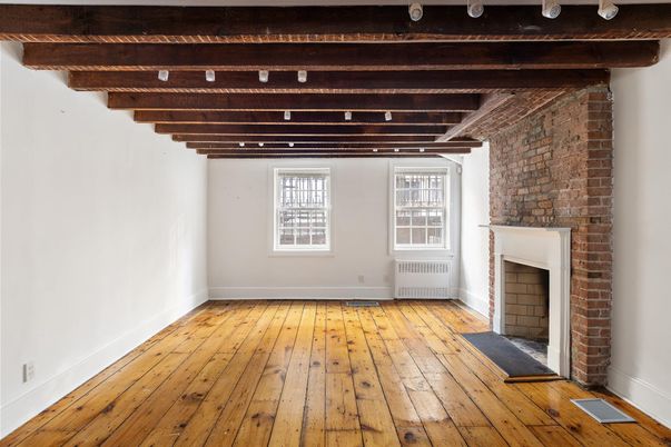 Empty room, Fireplace, Interior, Stone Walls, Wooden Beams, Wood Texture Flooring
