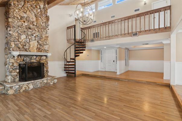 Chandelier, Fireplace, Interior, Stone Walls, Wood Texture Flooring