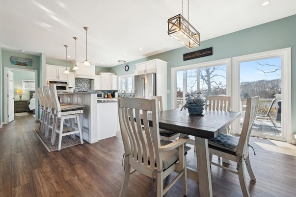 Dining room, Interior, Kitchen, Pendant Lights, Recessed Lighting, Stainless Steel Appliances, Wood Texture Flooring