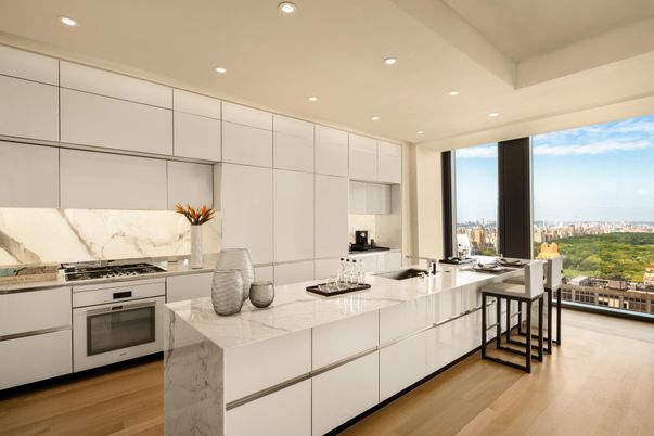 Interior, Kitchen, Marble Walls, Recessed Lighting, Stainless Steel Appliances, Wood Texture Flooring