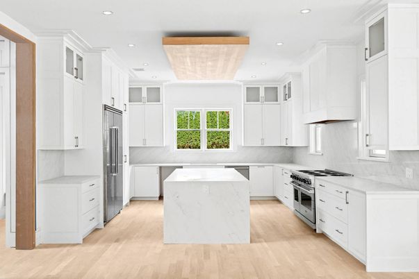Interior, Kitchen, Marble Walls, Recessed Lighting, Stainless Steel Appliances, Wood Texture Flooring