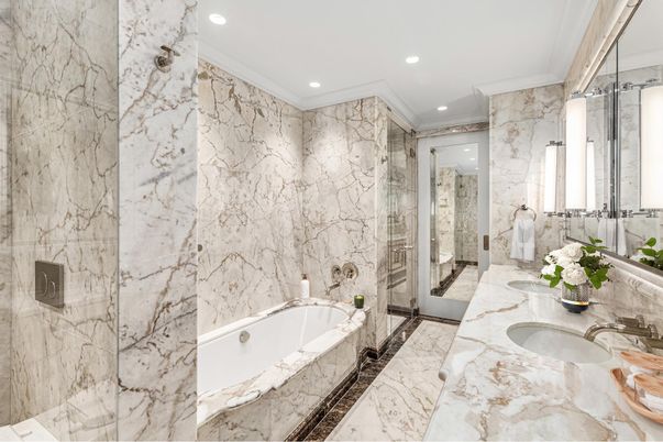 Bathroom, Dual Sink Vanities, Glass Shower, Interior, Marble, Marble Walls, Recessed Lighting