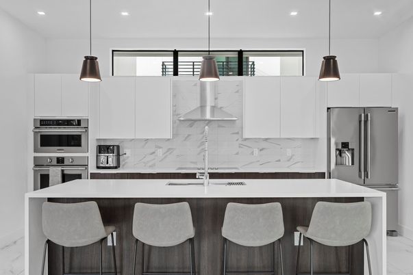 Interior, Kitchen, Marble, Marble Walls, Pendant Lights, Recessed Lighting, Stainless Steel Appliances
