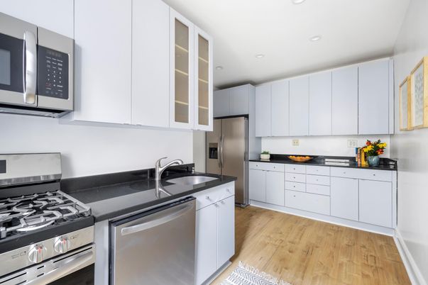 Interior, Kitchen, Recessed Lighting, Stainless Steel Appliances, Wood Texture Flooring