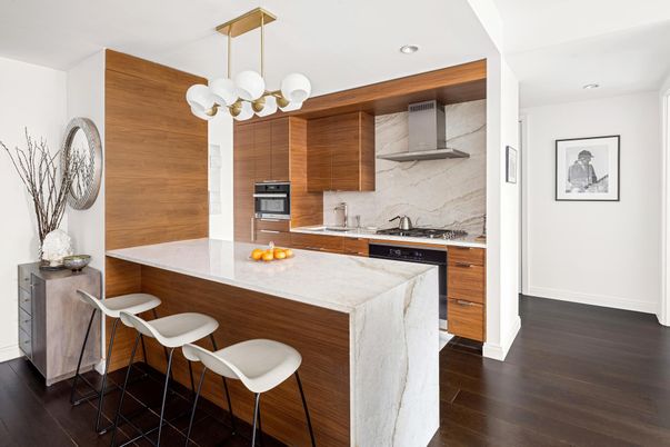 Interior, Kitchen, Marble Walls, Pendant Lights, Recessed Lighting, Stainless Steel Appliances, Wood Texture Flooring