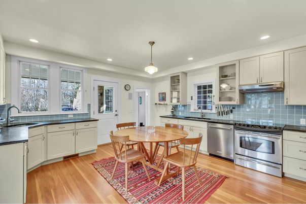 Dining room, Interior, Kitchen, Pendant Lights, Recessed Lighting, Stainless Steel Appliances, Wood Texture Flooring