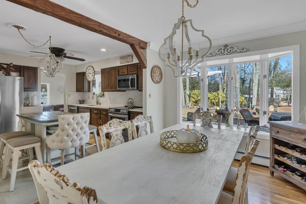 Chandelier, Dining room, Interior, Kitchen, Recessed Lighting, Stainless Steel Appliances, Wood Texture Flooring