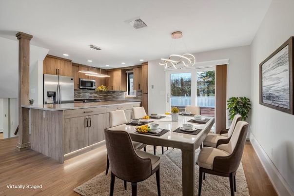 Dining room, Interior, Kitchen, Pendant Lights, Recessed Lighting, Stainless Steel Appliances, Wood Texture Flooring