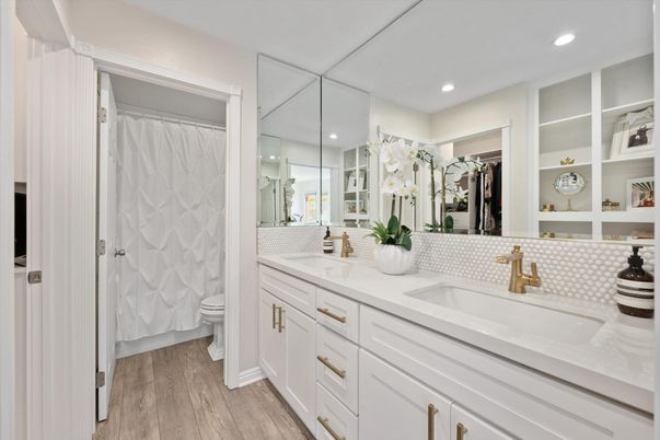 Bathroom, Dual Sink Vanities, Interior, Recessed Lighting, Wood Texture Flooring