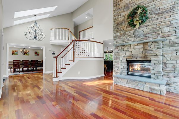 Chandelier, Dining room, Fireplace, Interior, Recessed Lighting, Stone Walls, Wood Texture Flooring