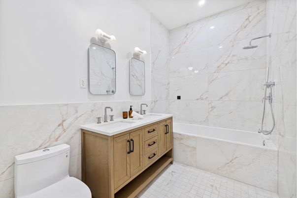 Bathroom, Dual Sink Vanities, Interior, Marble Walls, Recessed Lighting