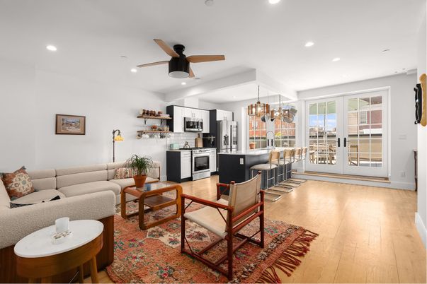 Chandelier, Interior, Kitchen, Living room, Pendant Lights, Recessed Lighting, Stainless Steel Appliances, Wood Texture Flooring