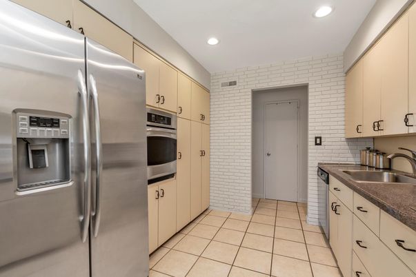 Interior, Kitchen, Recessed Lighting, Stainless Steel Appliances, Stone Walls