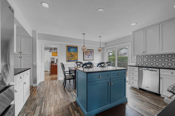Dining room, Interior, Kitchen, Pendant Lights, Recessed Lighting, Stainless Steel Appliances, Wood Texture Flooring
