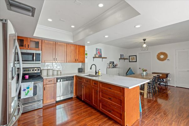Dining room, Interior, Kitchen, Pendant Lights, Recessed Lighting, Stainless Steel Appliances, Wood Texture Flooring