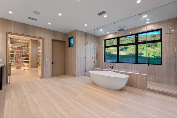 Bathroom, Free Standing Baths, Glass Shower, Interior, Recessed Lighting, Wood Texture Flooring, Wooden Walls