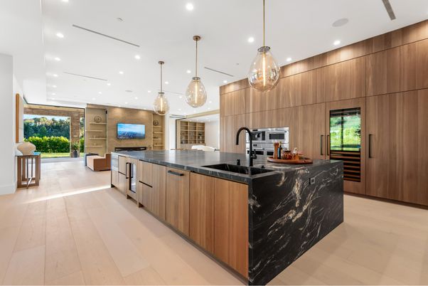 Interior, Kitchen, Marble Walls, Pendant Lights, Recessed Lighting, Stainless Steel Appliances, Wood Texture Flooring