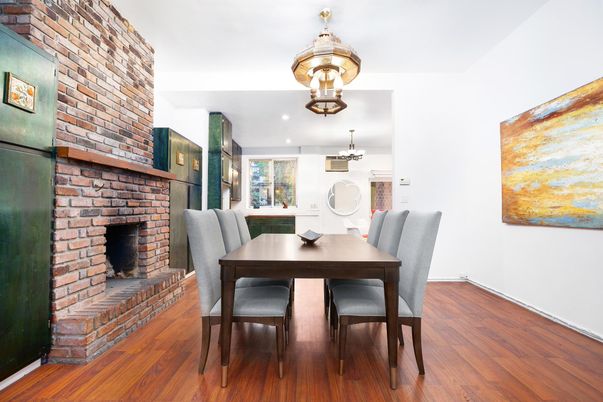 Dining room, Fireplace, Interior, Recessed Lighting, Stone Walls, Wood Texture Flooring