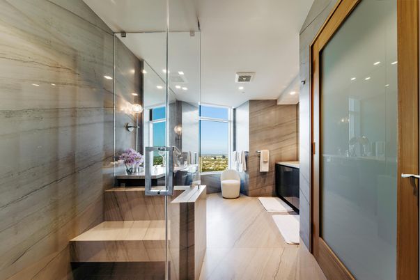 Bathroom, Free Standing Baths, Glass Shower, Interior, Marble Walls, Recessed Lighting, Wood Texture Flooring, Wooden Walls