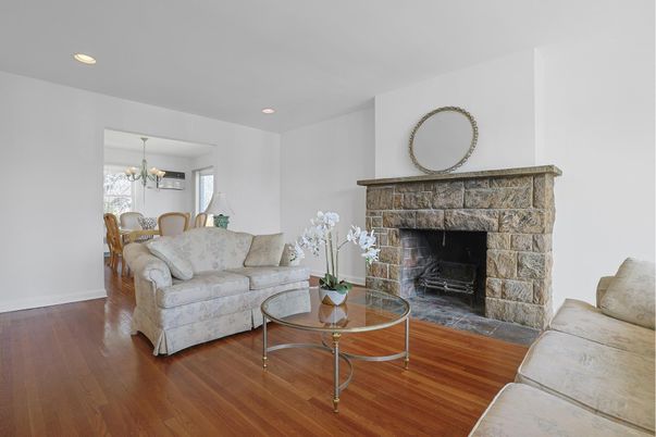 Chandelier, Dining room, Fireplace, Interior, Living room, Recessed Lighting, Wood Texture Flooring