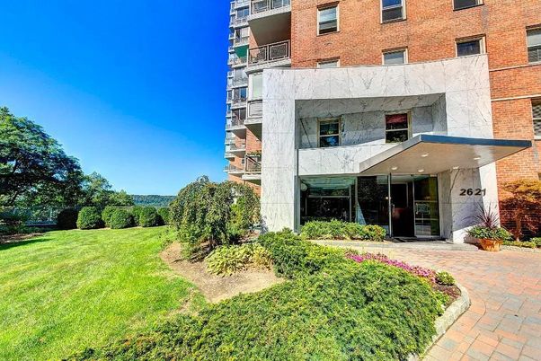 Backyard, Exterior, Facade, Brick Facade, Condo Building