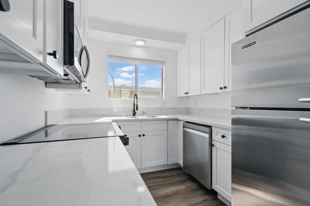Interior, Kitchen, Recessed Lighting, Stainless Steel Appliances, Wood Texture Flooring