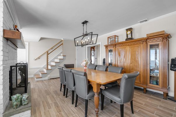Dining room, Fireplace, Interior, Pendant Lights, Wood Texture Flooring