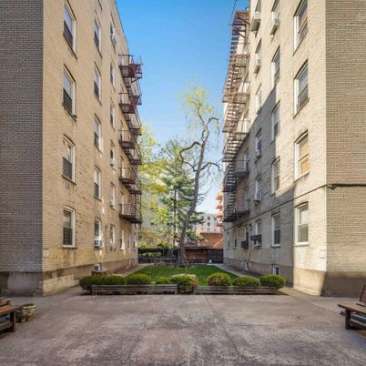Exterior, Facade, Brick Facade, Condo Building