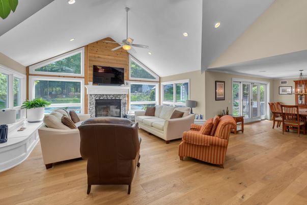 Dining room, Fireplace, Interior, Living room, Recessed Lighting, Wood Texture Flooring