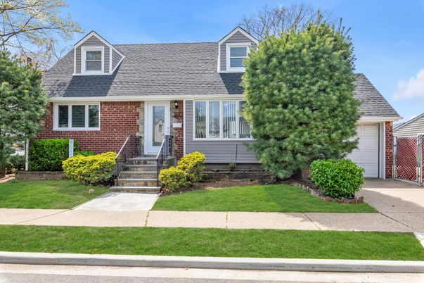 Attached, Exterior, Facade, Brick Facade, Cape Cod
