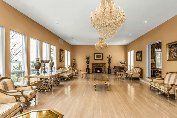 Chandelier, Dining room, Fireplace, Interior, Living room, Piano, Recessed Lighting, Wood Texture Flooring