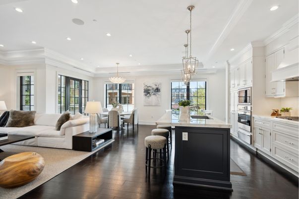 Chandelier, Dining room, Interior, Kitchen, Living room, Pendant Lights, Recessed Lighting, Stainless Steel Appliances, Wood Texture Flooring