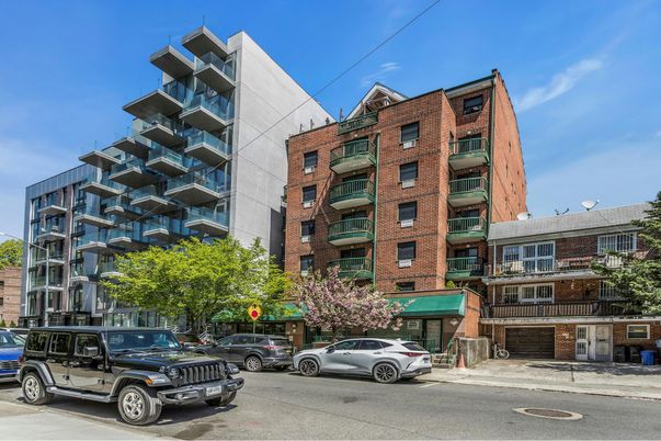 Exterior, Facade, Brick Facade, Condo Building