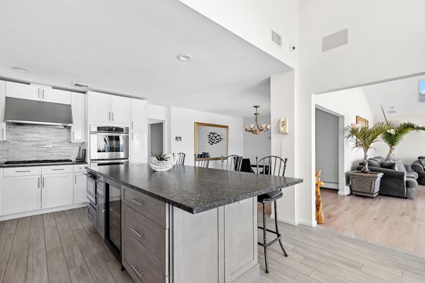 Chandelier, Dining room, Interior, Kitchen, Recessed Lighting, Stainless Steel Appliances, Wood Texture Flooring