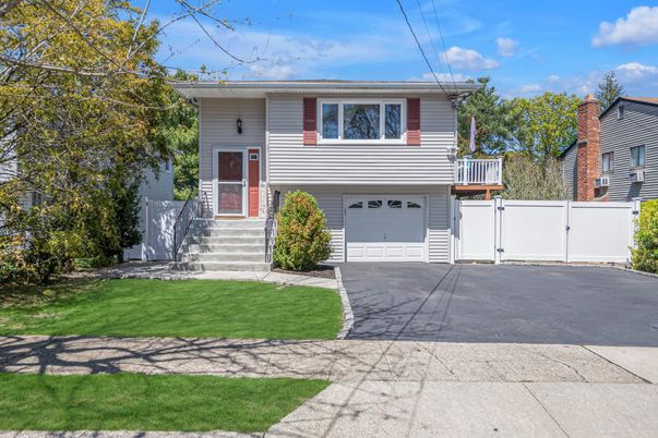 Attached, Exterior, Facade, Raised Ranch