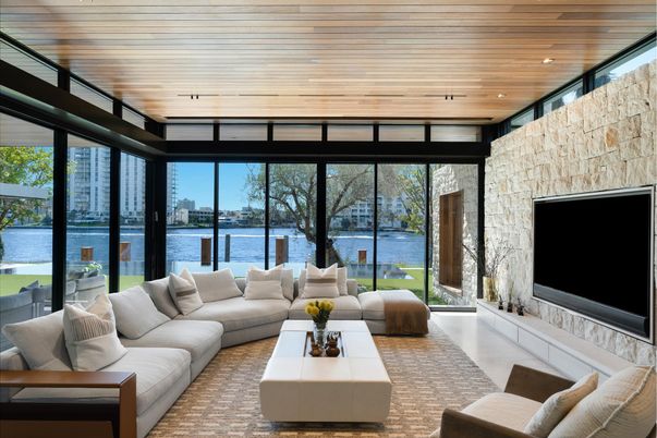 Fireplace, Interior, Living room, Recessed Lighting, Stone Walls, Water, Wooden Ceilings